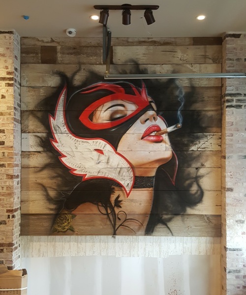 Restaurant Wall Mural of Lady at Gringos & Mariachis Restaurant in Potomac, Maryland.
