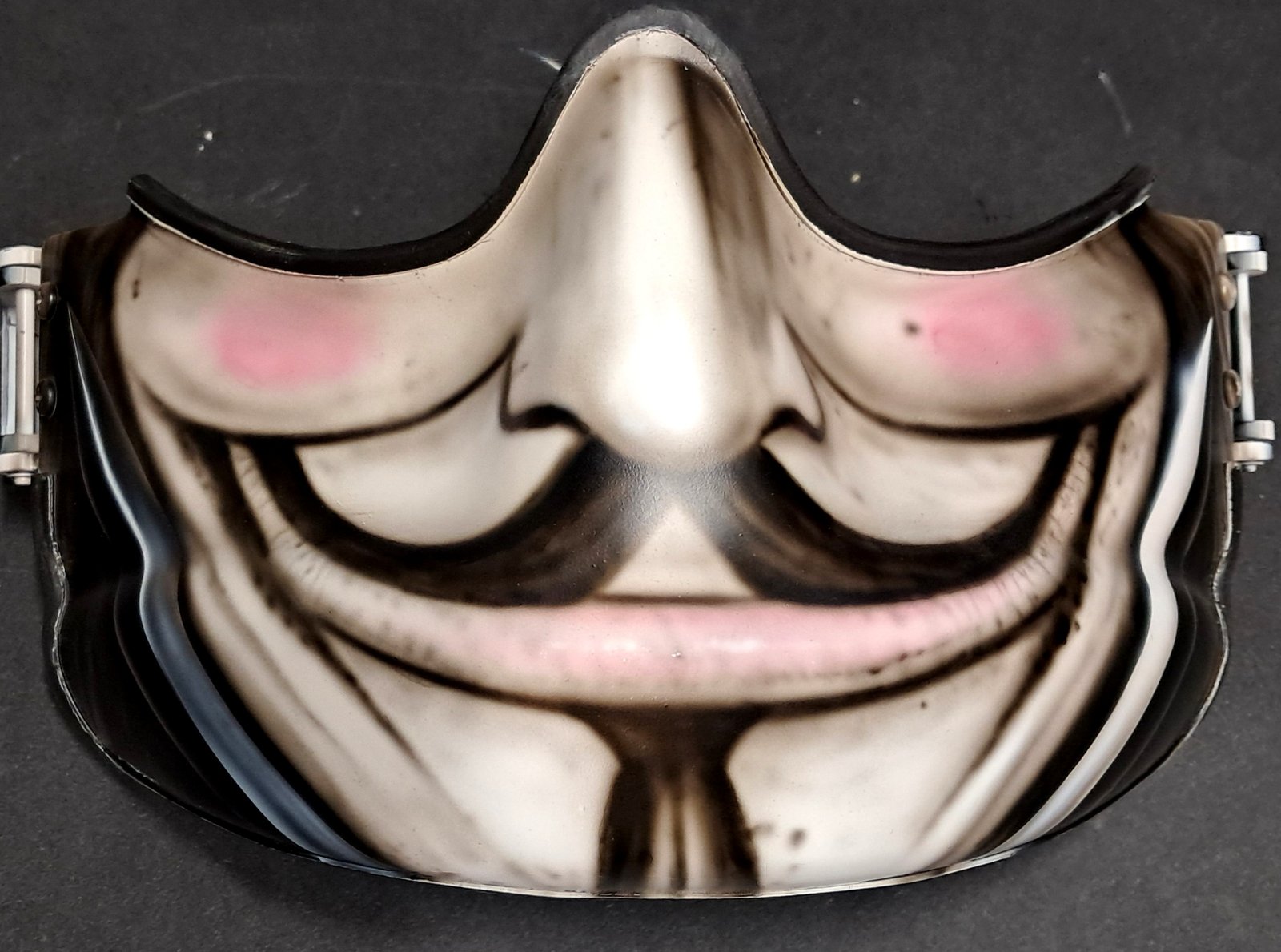 Salvador Dali-inspired mask with blush and smile.