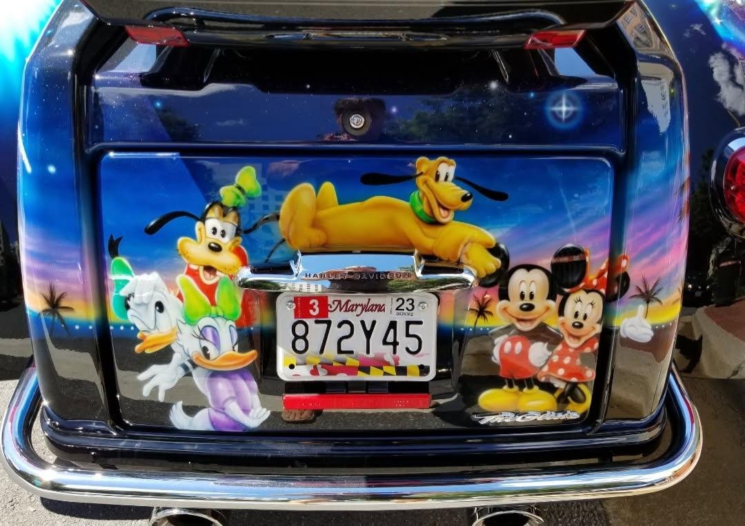 Mickey Mouse Clubhouse Cast on Back of Disney Themed Motorcycle