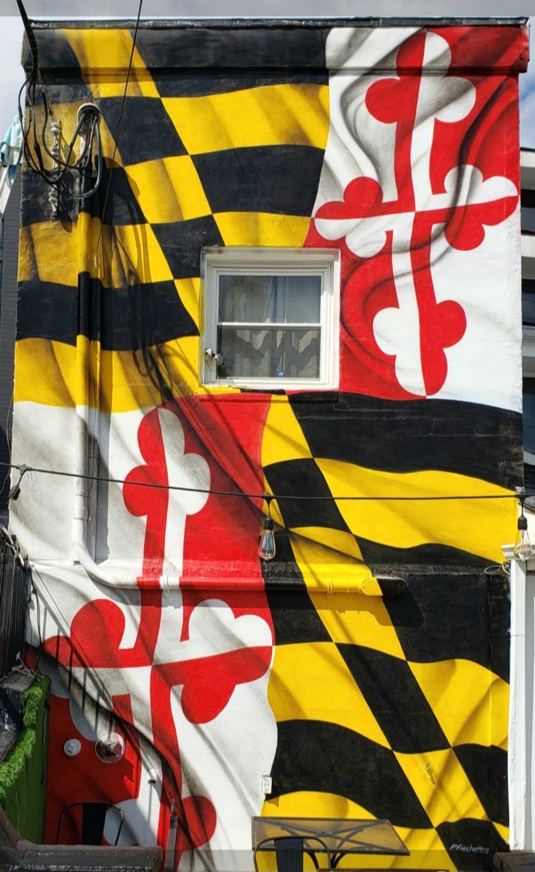 Mural Art of Maryland Flag On Side Of Building.
